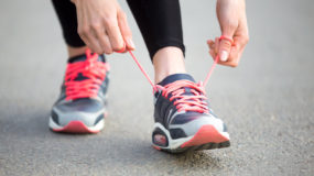 Lacing up tennis shoes